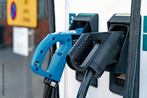 Wallpaper Mural Innovative electric vehicle charging station in a lush green setting showcases modern technology for eco-friendly transportation Torontodigital.ca