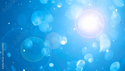 Blue lights backdrop. Bokeh and lens flare on light blue background.