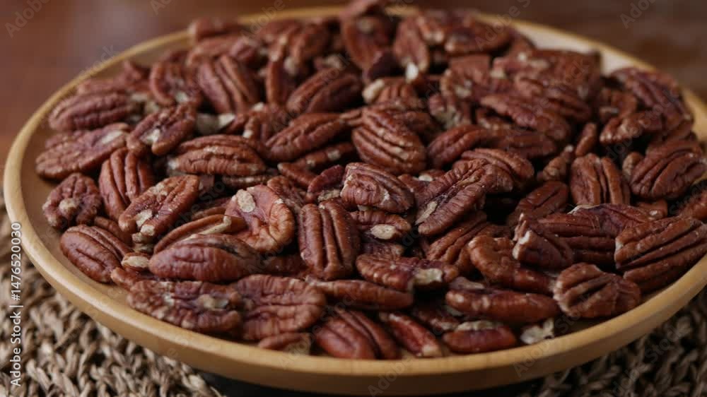 raw organic pecan nuts pattern background. raw organic pecan nuts pattern background.