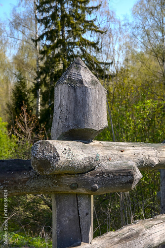 a very old wooden fence