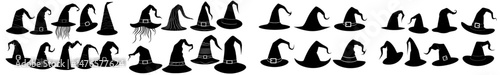 Silhouettes of black witch hats and isolated witches' magician accessories are prominent Halloween symbols