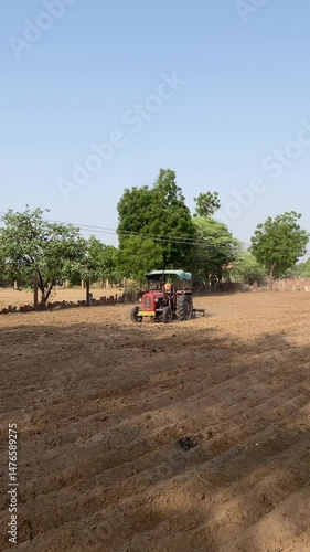 Tractor cultivating field In Jodhpur, Rajasthan, Cultivating Field in Indian Farm Land, Indian Agriculture System, Tractor, Farmer, Agriculture.