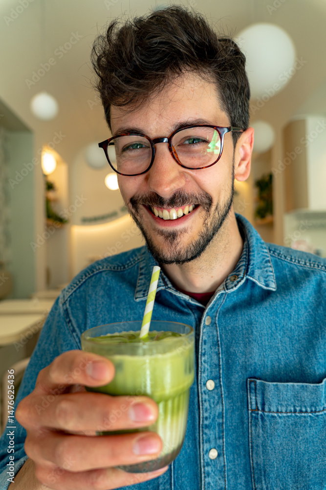Happy customer savoring a refreshing matcha latte while enjoying the vibrant atmosphere of a modern cafe, radiating joy and relaxation Happy customer savoring a refreshing matcha latte while enjoying the vibrant atmosphere of a modern cafe, radiating joy and relaxation