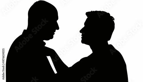 Silhouette of a doctor examining a patient, healthcare symbolism