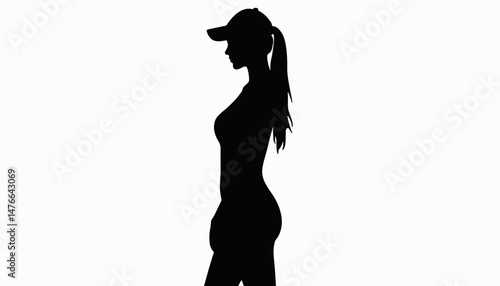 Silhouette of woman in cap standing confidently, empowerment concept