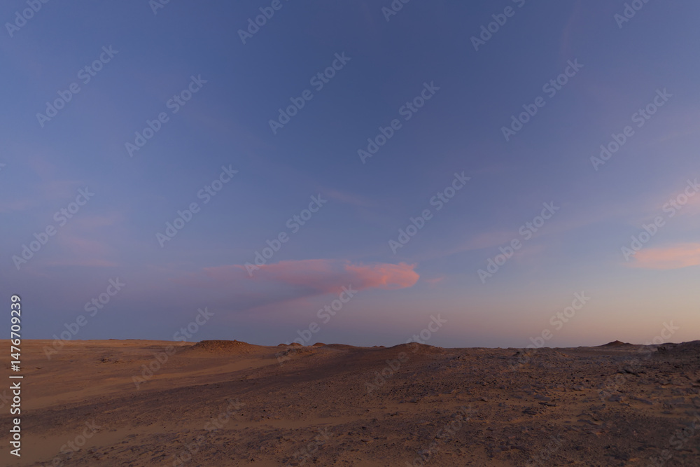 Naklejka premium Sunset colors in the Valley of Agabat, Egypt
