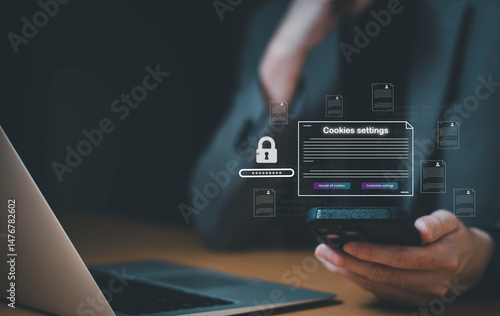 hand using laptop while choose to accept internet cookies policy or reject. Customer data privacy concept that allow web browser to collect user data to resell or use for marketing purpose