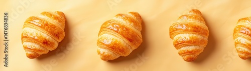 Wallpaper Mural Freshly Baked Golden Croissants on Yellow Background for Gourmet Breakfast or Bakery Theme Torontodigital.ca