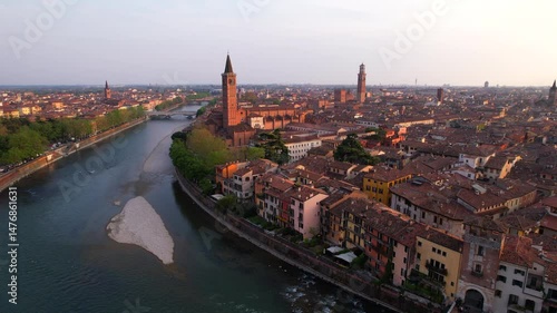Wallpaper Mural Colorful Verona city buildings over Adigio river at sunset. Aerial dolly in Torontodigital.ca