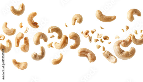 Flying Cashew Nuts Whole And Sliced Falling On Transparent Background

