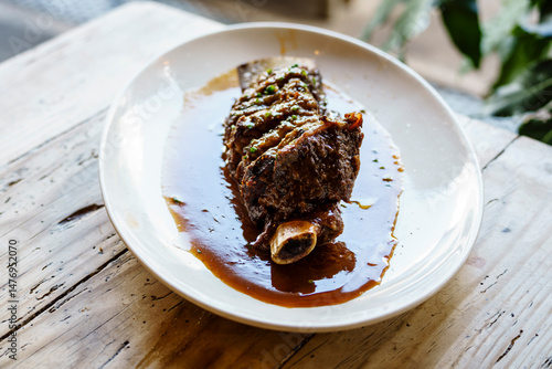 Fototapeta Naklejka Na Ścianę i Meble -  Grilled Irish black angus rib with demi glace, Sant Cugat del Vallès, (Vallès Occidental), Catalonia, Spain