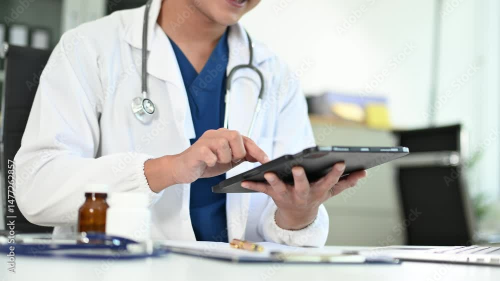 Medical technology concept. Doctor working with mobile phone and stethoscope and digital tablet laptop at hospital Medical technology concept. Doctor working with mobile phone and stethoscope and digital tablet laptop at hospital
