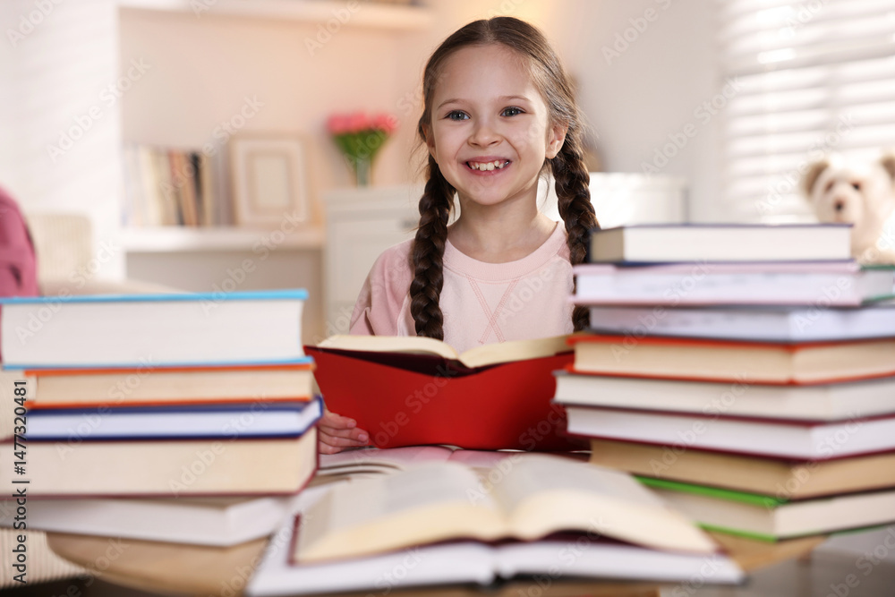 Cute girl with many different books at home Cute girl with many different books at home