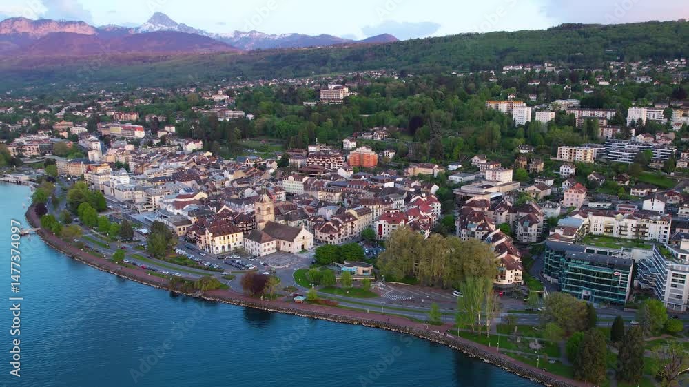 An Panoramic aerial of the old town of the city Évian-les-Bains in France on a sunny day in summer An Panoramic aerial of the old town of the city Évian-les-Bains in France on a sunny day in summer
