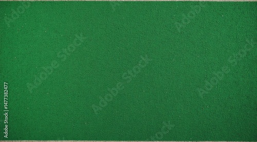 Uniform, deep green surface, likely a billiard table's felt