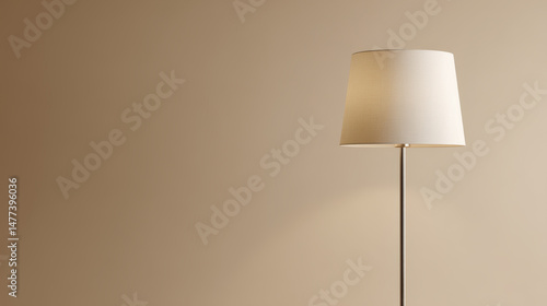classic floor lamp with soft warm light positioned against clean pastel wall