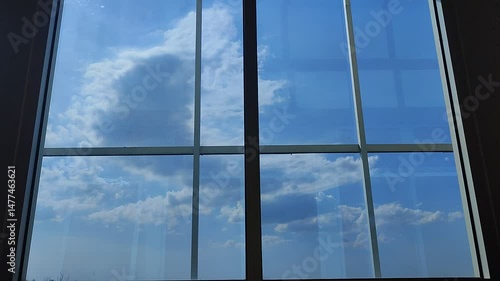 modern office building with clouds