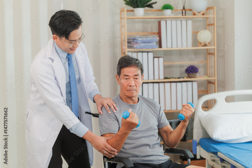 Fototapeta premium Patient with weak arm muscles doing light dumbbell exercises during physical therapy to regain strength and support physical recovery.