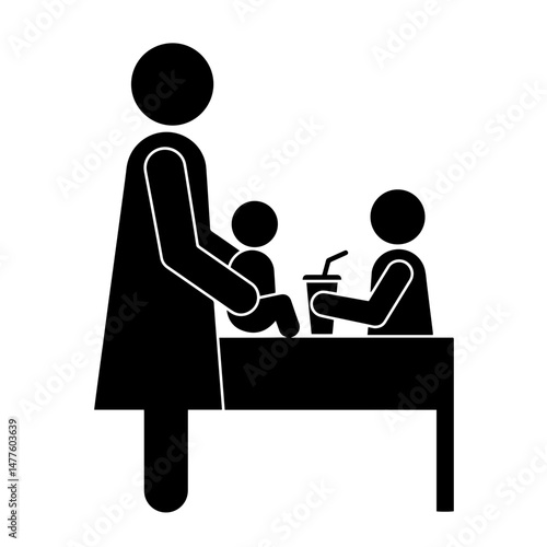 Mother caring for two children at a table with a drink
