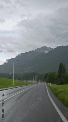 Vertical view of Austria road from car