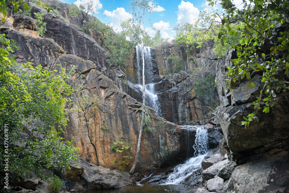 Obraz premium the amazing Boulder Creek Falls in Kakadu National Park, with natural swimming pool at the bottom, Northern Territory, Australia