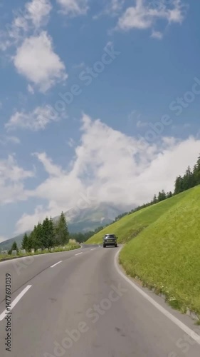 Vertical view of Austria road from car