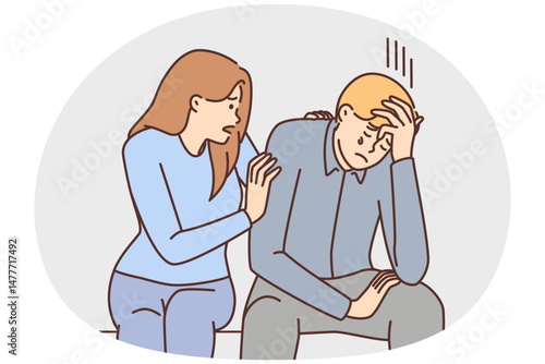 Caring girl comforts crying boyfriend who is upset about failure in career