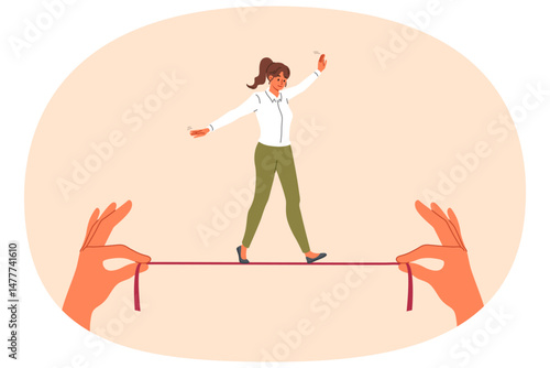 Businesswoman takes risks, walking thin tightrope in hands of employer, demonstrating ability to balance while achieving goal. Successful girl in business clothes shows balance skills