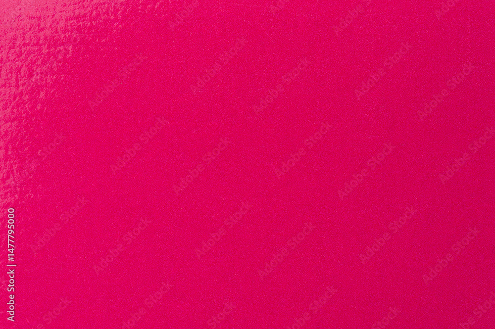 Bright pink surface showcasing vibrant hue ideal for creative projects