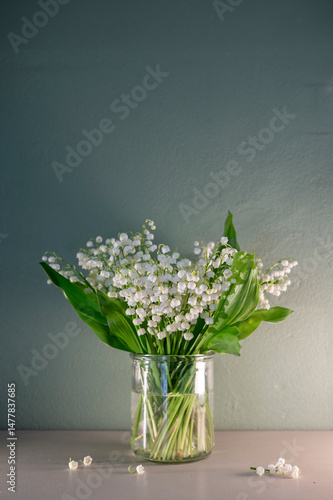 White Lily of the Valley on Pastel Background
