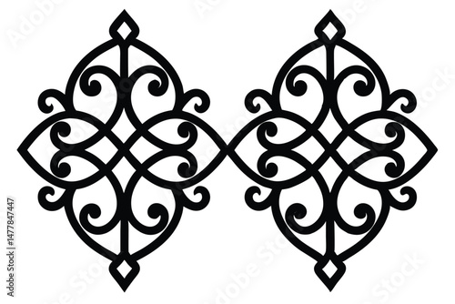 Ornate black wrought iron forms a decorative metal gate and fence with a vintage floral design