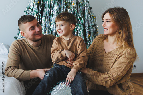 Obraz na płótnie A Joyful Family Portrait Celebrating Togetherness During the Blissful Holidays Within a Cozy, Festive Setting Filled with Love and Happiness, Capturing Cherished Moments with Family and Friends w salonie