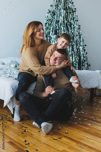 Obraz na płótnie Joyful Family Moments Celebrating Togetherness with Loved Ones During the Cheerful Holiday Season Full of Warmth, Happiness, and Loving Memories Built Around Traditions and Festivities w salonie