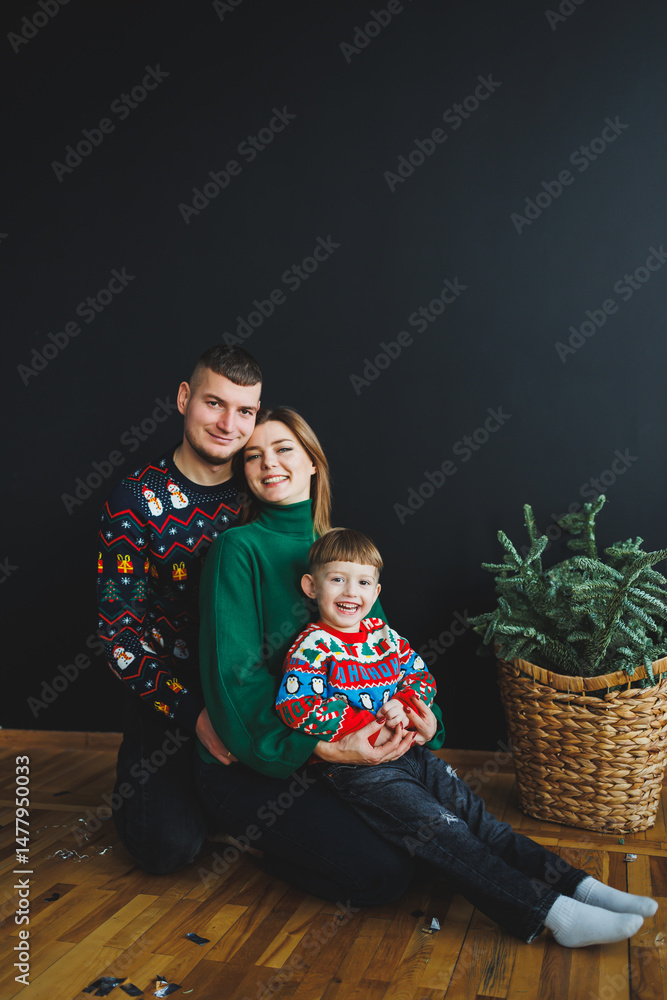 Family Christmas Portrait A Heartwarming Celebration of Togetherness in Festive Sweaters Set Against a Dark, Elegant Background, Capturing the Essence of Holiday Cheer and Joyful Family Bonding