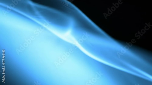 Blue light elegantly flows and intertwines, creating a mesmerizing display of patterns that evoke a sense of fluid motion. The captivating visuals draw viewers into a tranquil atmosphere.