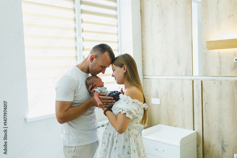 New Parents Cherish and Treasure Precious Moments with Their Newborn Baby in a Beautifully Cozy and Modern Nursery, Creating Lasting Memories Filled with Love and Joy in Their Family Life