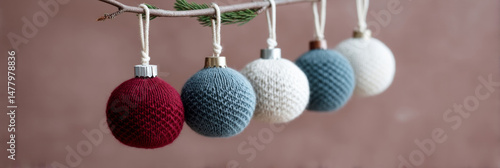 Knit-textured ornaments dangle whimsically, invoking Scandinavian Yuletide warmth and the whimsical charm of Knitting Day festivities