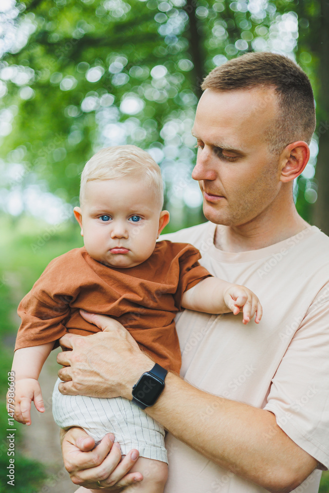 A Heartwarming Moment Captured Between a Father and His Baby While Surrounded by Beautiful Nature, Evoking Feelings of Affection, Joy, and Love, Reflecting the Purest Aspects of Parenthood
