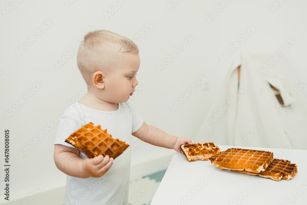 A Curious Toddler Engaged in Exploring Delicious Waffles at the Breakfast Table, Enjoying Their Morning Meal with Wonder and Delight, Filled with Innocent Joy and Childhood Curiosity