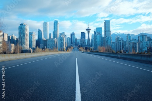 Empty Asphalt Road Leading To City Skyline with Modern Skyscrapers and Tower