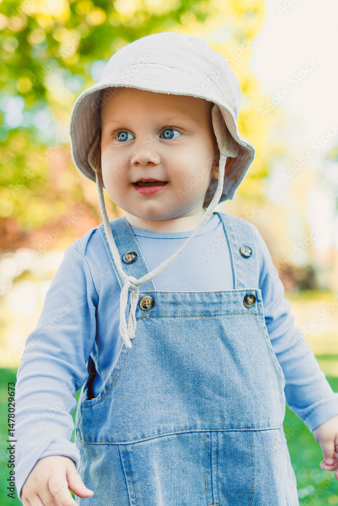 An Adorable Toddler in Nature With Sparkling Eyes and a Joyful Smile, This Little One Enthusiastically Enjoys a Vibrant Floral Landscape, Exuding Pure Joy and Innocence in Every Delightful Moment