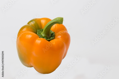 Orange Bell Peppers on White Background