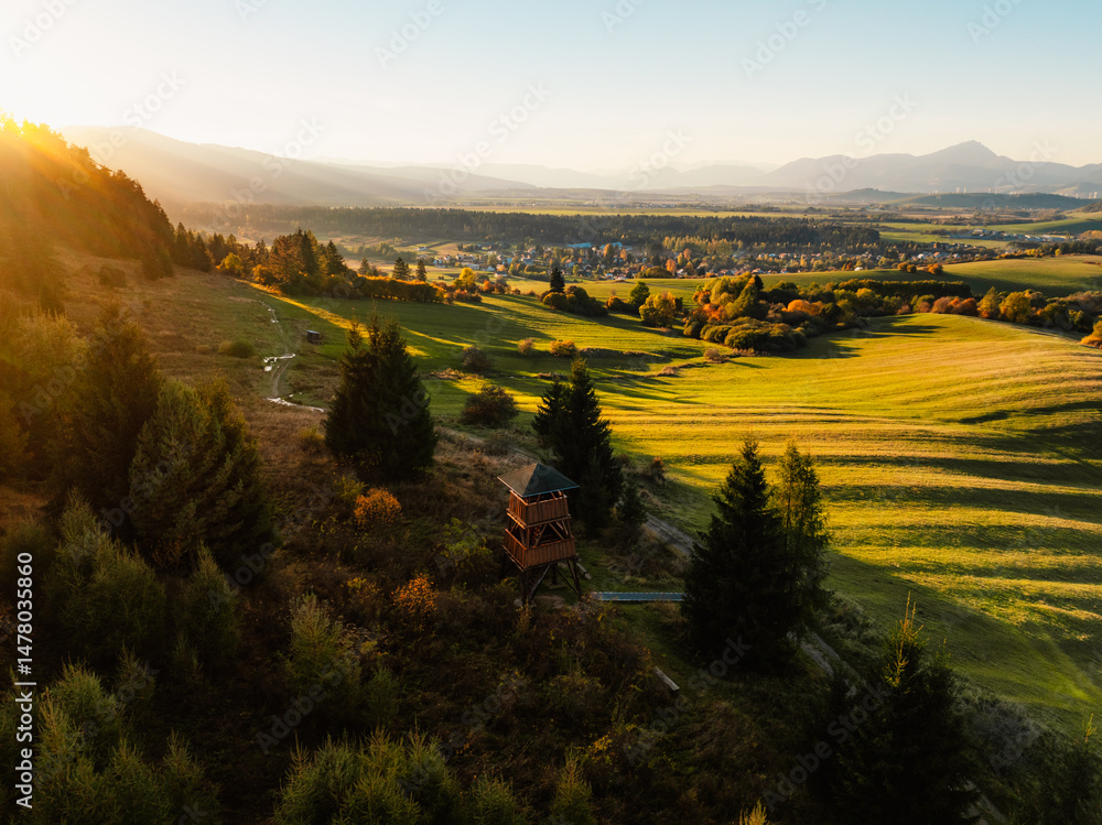 Sunset over Liptov region with and High Tatras mountains around. Liptovsky Mikulas landspace, slovakia.
