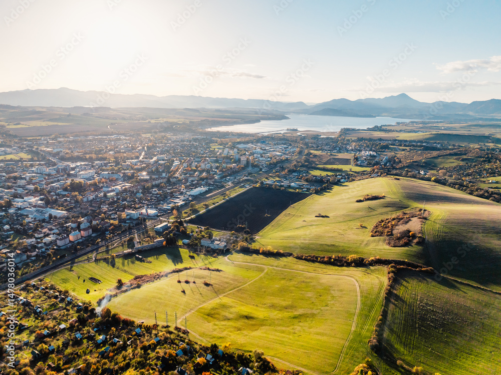 Sunset over Liptov region with High Tatras mountains around. Liptovsky Mikulas landscape, Slovakia.
