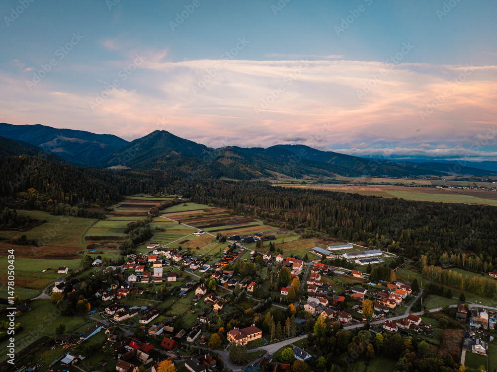 Sunset over Liptov region with and High Tatras mountains around. Liptovsky Mikulas landscape, slovakia.