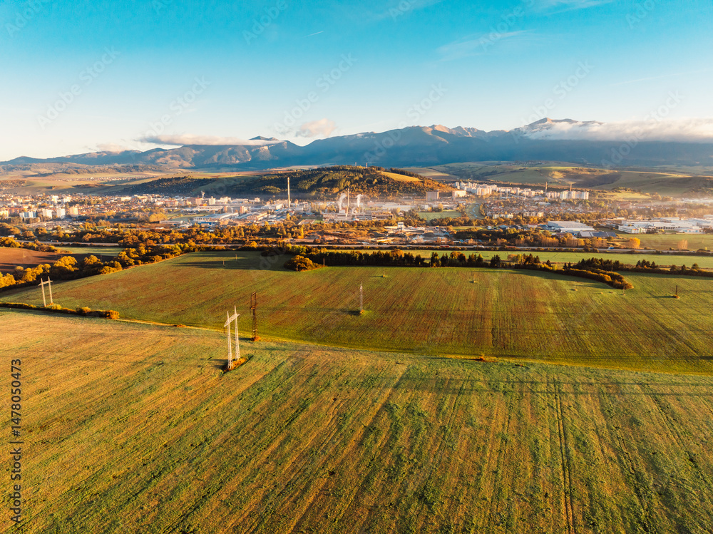 Sunset over Liptov region with and High Tatras mountains around. Liptovsky Mikulas landscape, slovakia.