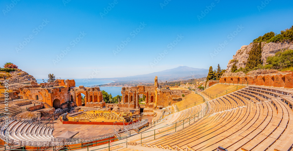 Ancient theater of Taormina with Mount Etna in the background, Sicily, Italy