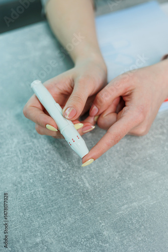 Obraz na płótnie A CloseUp View of Hands Skillfully Using a White Pen for Various Creative Arts and Crafts Projects, Showcasing the Intricate Details and Techniques Involved in Artistic Expression and Design w salonie