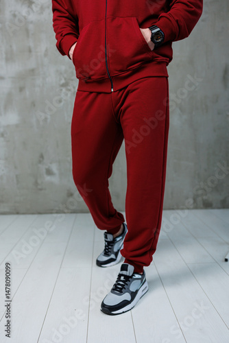 Obraz na płótnie Athletic Fashion A Trendy, Stylish and Casual Red Sportswear Set Designed Perfectly for a Modern Lifestyle, Ideal for Fashion Enthusiasts Who Enjoy Comfortable and Chic Activewear Options w salonie