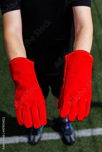 Discover the Vibrant Red Sports Gloves, meticulously designed to provide optimal grip and performance during various athletic activities, ensuring you can excel in your sports endeavors with ease